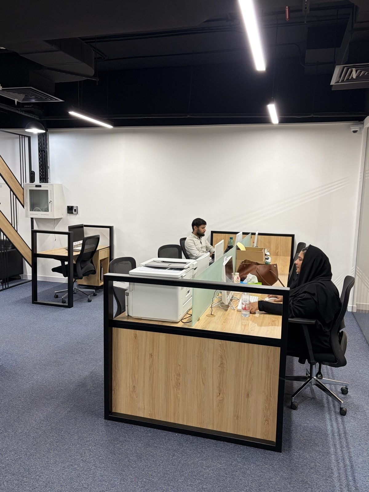 FishMarket.ai office desks and staff workspace