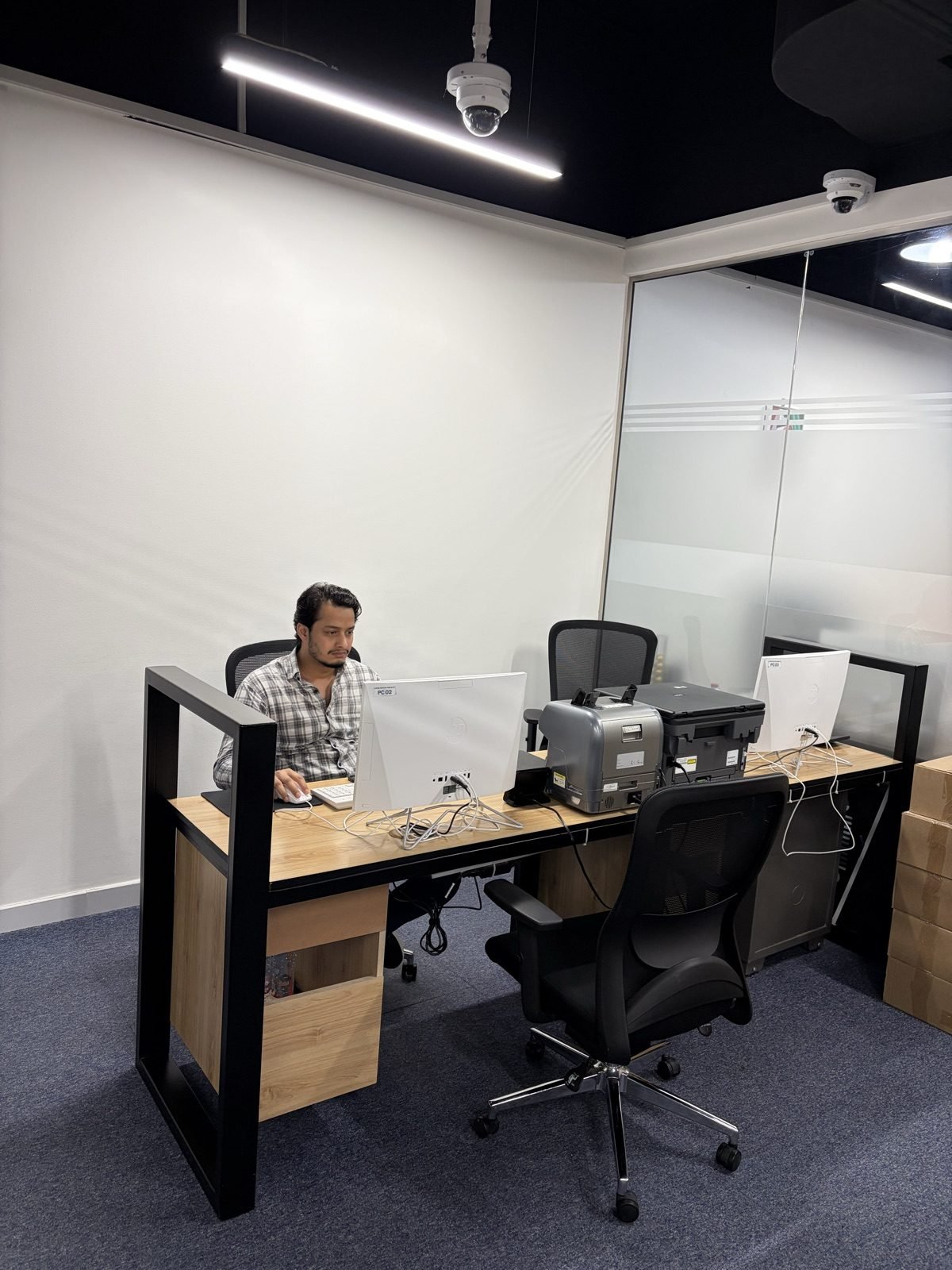FishMarket.ai office workstation and team desk