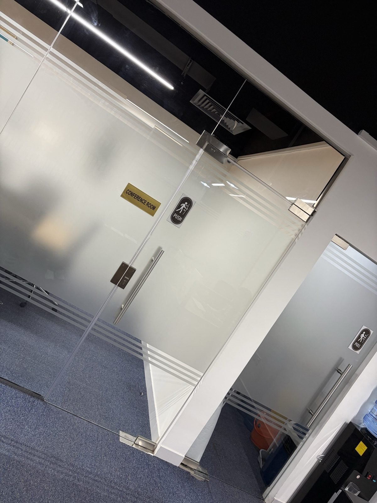 FishMarket.ai glass office partition and interior workspace